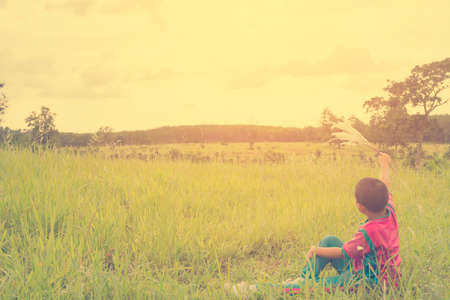 Child happy with mountain view,Or boy happy for travel and relax with mountain and sunshine view.1の写真素材
