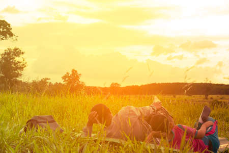 Family with mountain view,Or Father and son are happy with travel and picnic with mountain and sunshine view.の写真素材