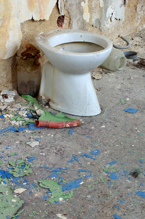 toilet bowl in public ruins interiorの写真素材