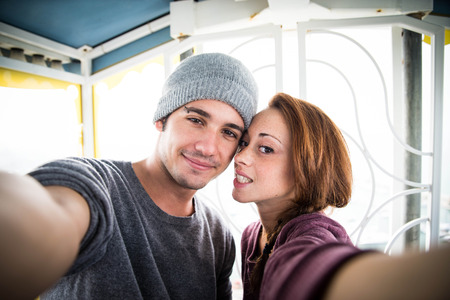 couple in love to take selfie With Their room - Caucasian people - people, relationship and technology conceptの写真素材
