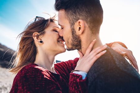 Sensual couple in love is kissing outdoorの写真素材