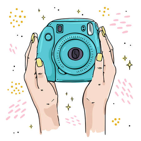 Illustration of a hand holding an instant print camera.のイラスト素材