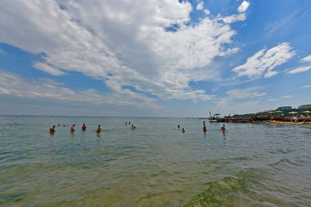 Ukraine, Odessa 07/28/2020. Otrada is a popular beach in Odessa. The entrance to the beach is completely free. The beach is clean and well-groomed, moderately crowded, and within walking distance therのeditorial素材