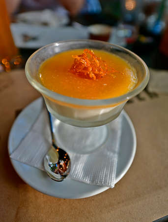 Quince tatlysy. An amazingly tasty and at the same time quite uncomplicated dish. Served with heavy cream, sprinkled with chopped nuts.の写真素材