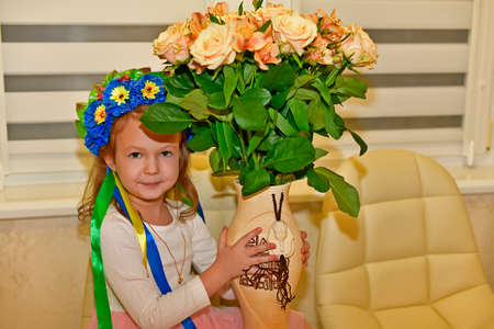 Mom and daughter with beautiful bouquets of flowers.の写真素材