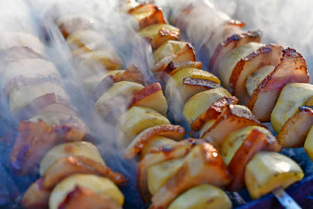 Delicious kebab of potatoes and lard.