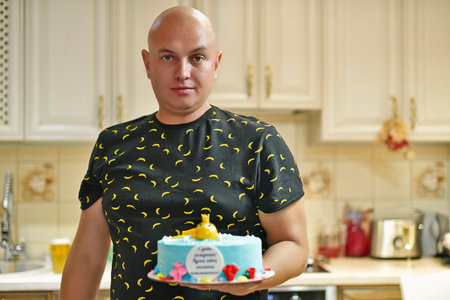 Family wife and children celebrate dad's birthday.の写真素材