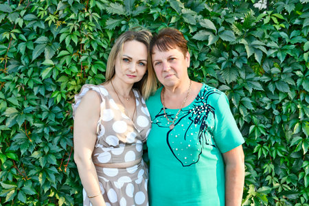 On the anniversary of an adult woman turning 65, the whole extended family celebrates.