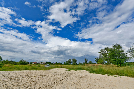 Beautiful countryside views along the river bank. The Samara River is a left tributory of the largest river in Ukraine, the Dnieper. It originates from the small village of Veselayの写真素材