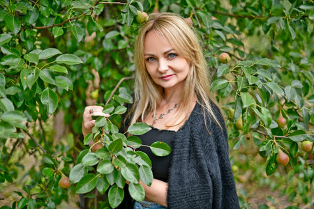 The family attended the girl's competition, where the child won an award, a toy and a bouquet of roses.の写真素材