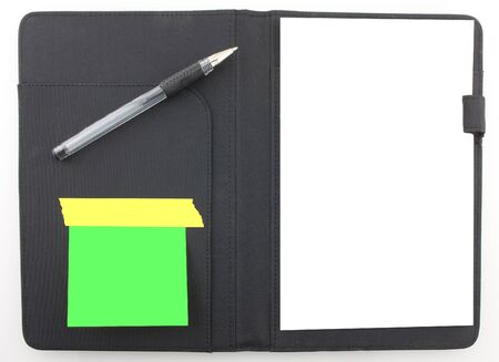 Business agenda planner with paper and a black pen. Post it notesの写真素材