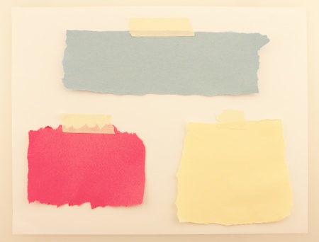 Colored background paper of red, blue and tan