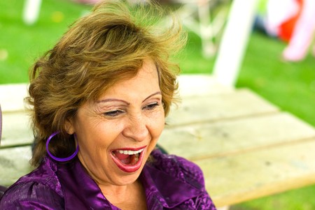 senior  lady 50 60 woman laughing smiling and happyの写真素材