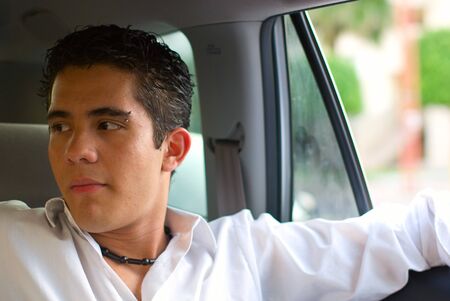 male passenger in carの写真素材