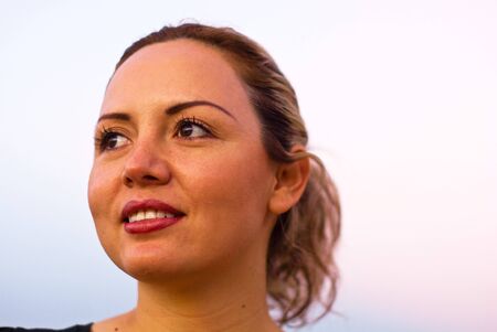 pretty face woman smile outsideの写真素材