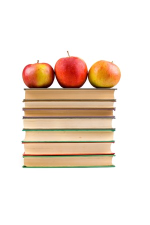 Apples and books isolated on a white backgroundの写真素材