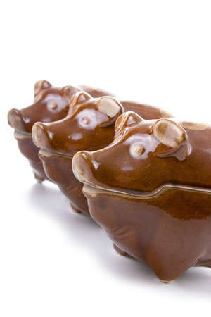 Ceramic piggy pots  a on a white backgroundの写真素材