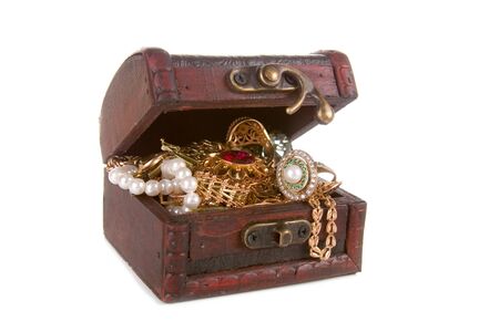 Brown chest with treasures isolated on white backgroundの写真素材