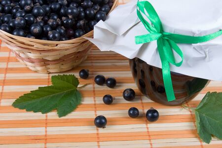 Fresh berries in a wicker basket の写真素材
