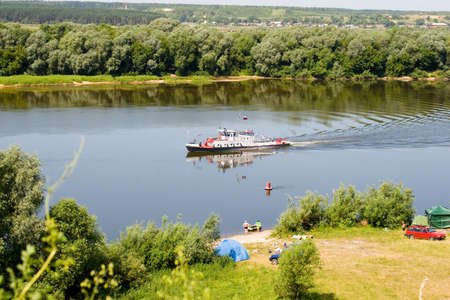 Summer holidays in the river, fishing and tentの写真素材