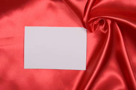 White card for congratulation on silk background の写真素材