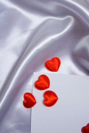 White card for congratulation on  silk background の写真素材