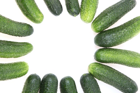 Frame made of cucumbers on white backgroundの写真素材