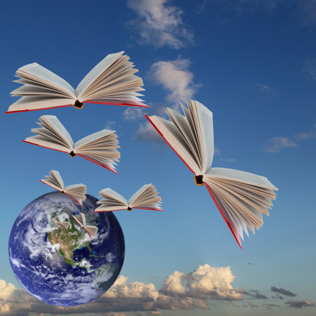 Books are flying against the background of the cloudy sky and  earthのeditorial素材