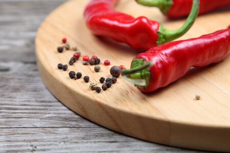 Chili peppers on a wooden table