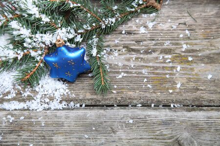 Blue Christmas decorations on a wooden backgroundの写真素材