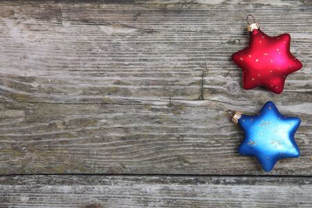 Christmas decorations. Stars on a wooden backgroundの写真素材