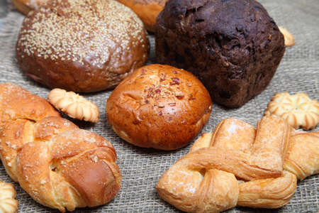 Various bread on a wooden background close-up