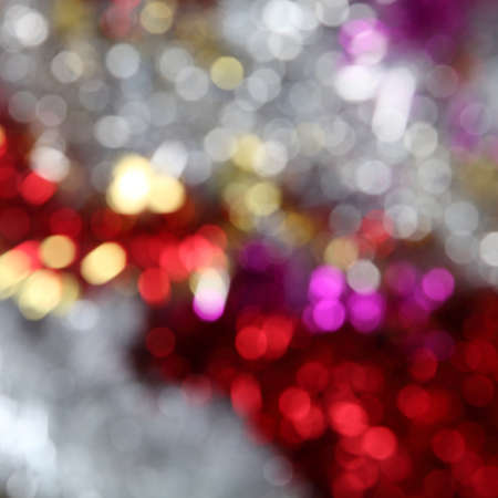 Christmas background of bright blurry lightsの写真素材