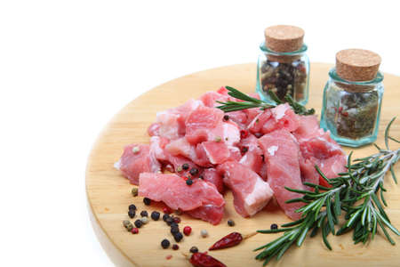 Raw meat, herbs and spices isolated on white backgroundの写真素材