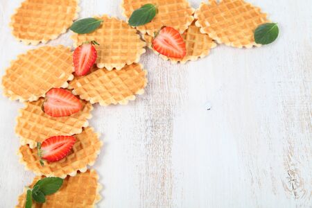 Waffles and ripe strawberries. Delicious summer dessert.の写真素材
