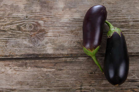Eggplant on a wooden backgroundの写真素材