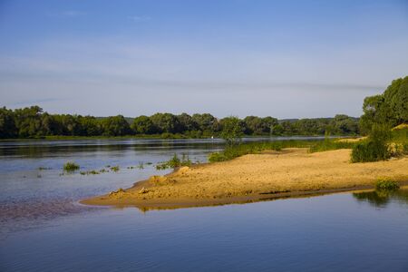 Beautiful landscape with the river in the summer day
