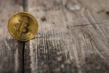 Bitcoin on an old wooden table. Ð¡oncept of e-commerce.の写真素材