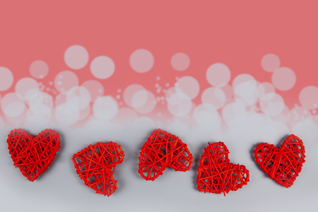 Border of red hearts on a gray background. Valentine card.の写真素材