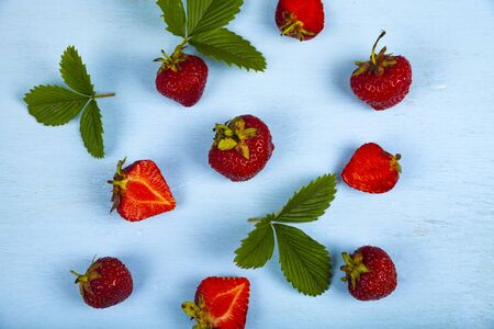 Ripe strawberries on a wooden table. Delicious berries.の写真素材