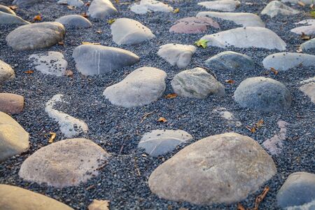 Beautiful stone walkway in the park closeup.