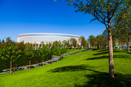 City Park "Krasnodar" or Galitsky Park. Beautiful trees and lawns in the park around the football stadium "Krasnodar". Landscaping. Krasnodar, Russia - July 11, 2020のeditorial素材