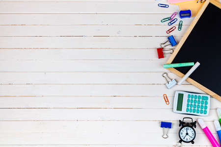 Various school supplies on a wooden table. Back to school. Stationery.の写真素材