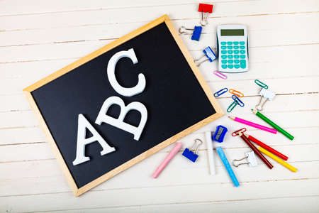 Letters ABC and chalk board. Back to school. Stationery.の写真素材