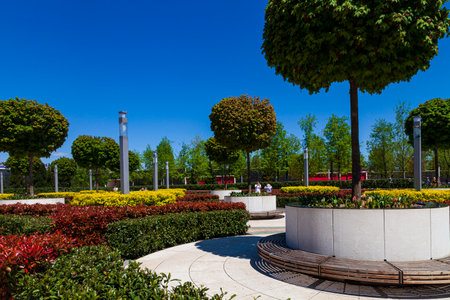 City Park "Krasnodar" or Galitsky Park. French garden in a picturesque park around the football stadium "Krasnodar". Landscaping. Krasnodar, Russia - May 5, 2021のeditorial素材