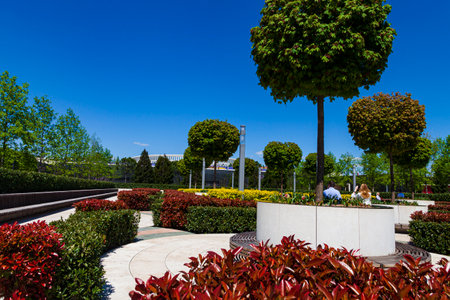 City Park "Krasnodar" or Galitsky Park. French garden in a picturesque park around the football stadium "Krasnodar". Landscaping. Krasnodar, Russia - May 5, 2021のeditorial素材