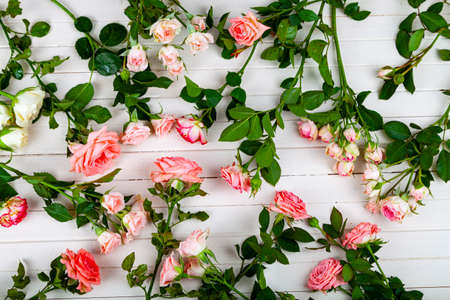 Bouquet of pink roses on a light wooden background. Beautiful card.Floral background.の写真素材