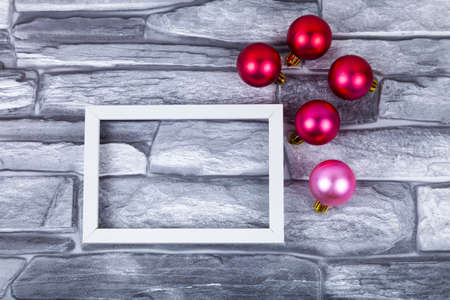 Frame and Christmas decor on a gray background. Christmas card. Place for your text.の写真素材