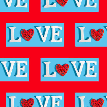 Seamless pattern with the word Love on a blue background. Valentine's day card.