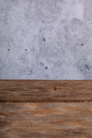 Background with place for text. photo background. Brown wooden background and stone wall.の写真素材